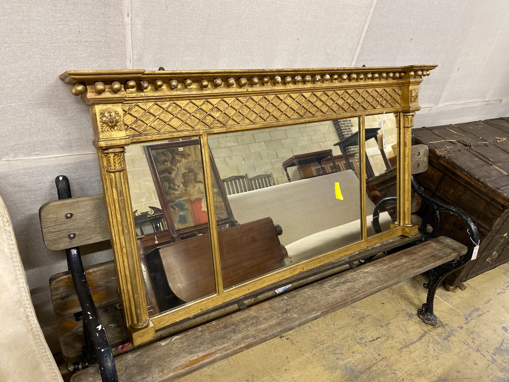A Regency giltwood and composition triple plate overmantel mirror, width 155cm, height 80cm